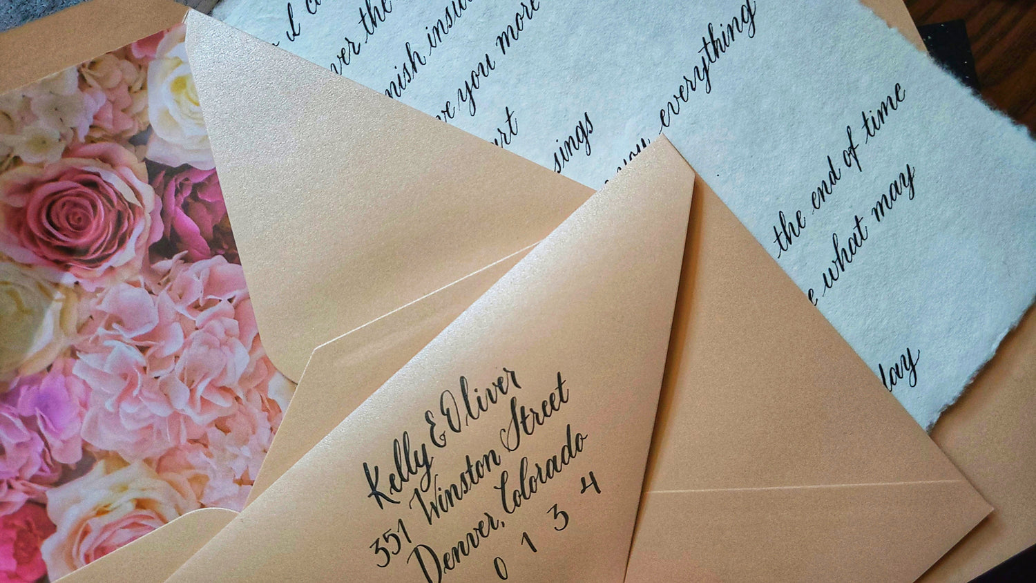 Envelope suite featuring elegant calligraphy, envelopes, and custom envelope liner created by Sparrow and Ink Designs, Colorado Calligrapher